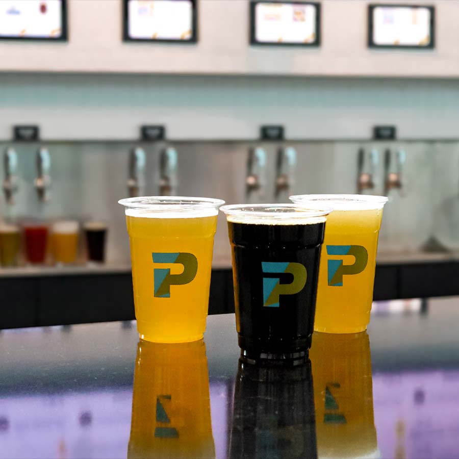 Drink cups at Penn Cinema featuring an icon derived from the updated logo.